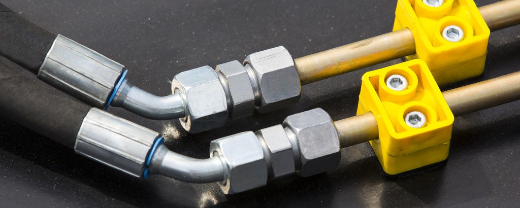 Zur Prüfung befähigte Person von Hydraulik-Schlauchleitungen